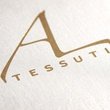 AL TESSUTI